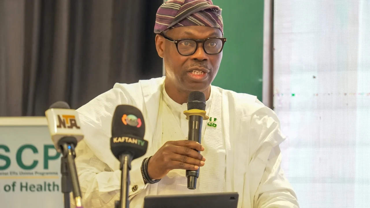 Minister of State for Health and Social Welfare Dr Iziaq Adekunle Salako presenting the Basic Health Care Provision Fund scorecard in Abuja